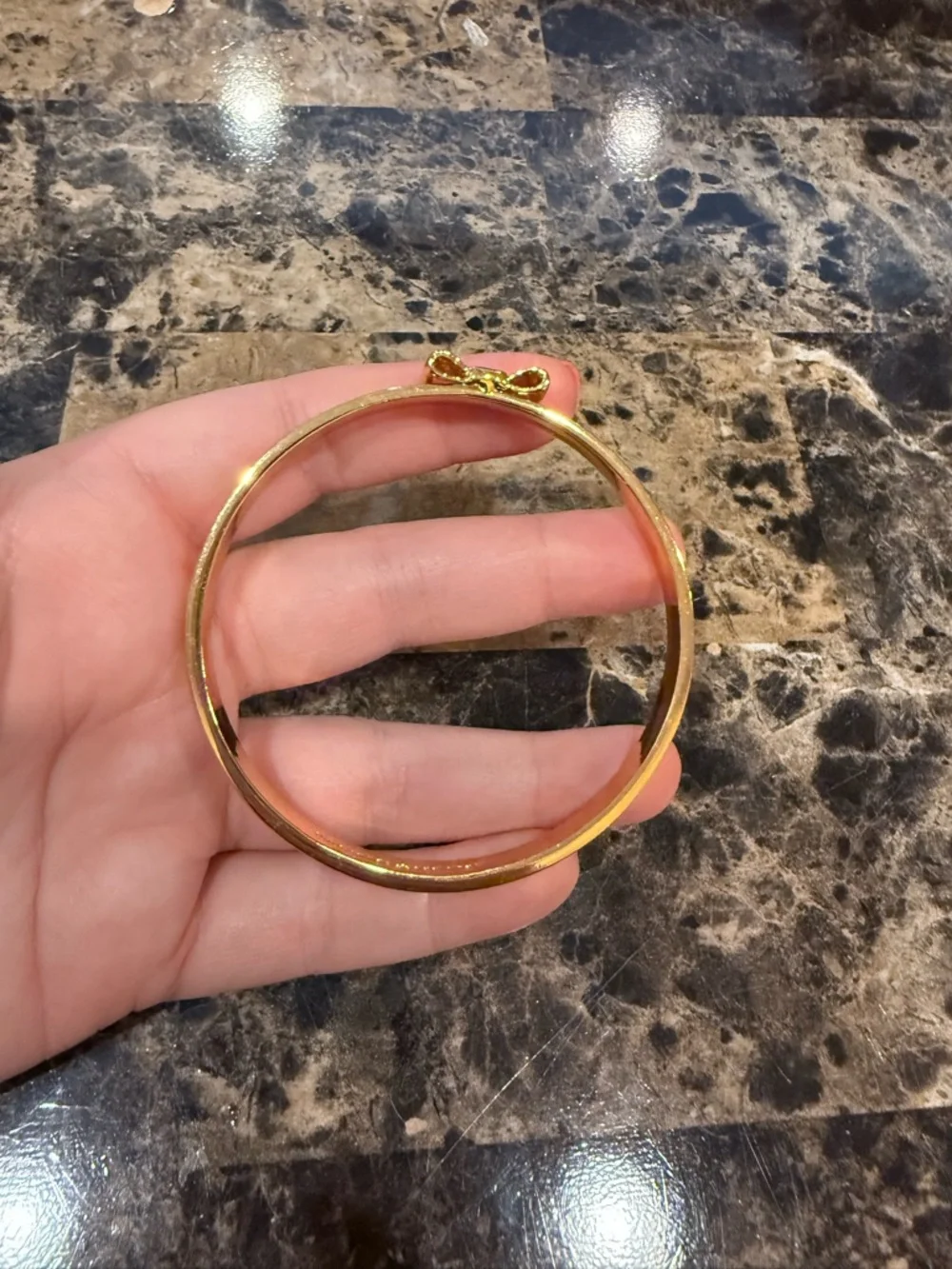 Kate Spade "Take a Bow" Gold Slip-On Bangle Bracelet - Picture 4 of 8